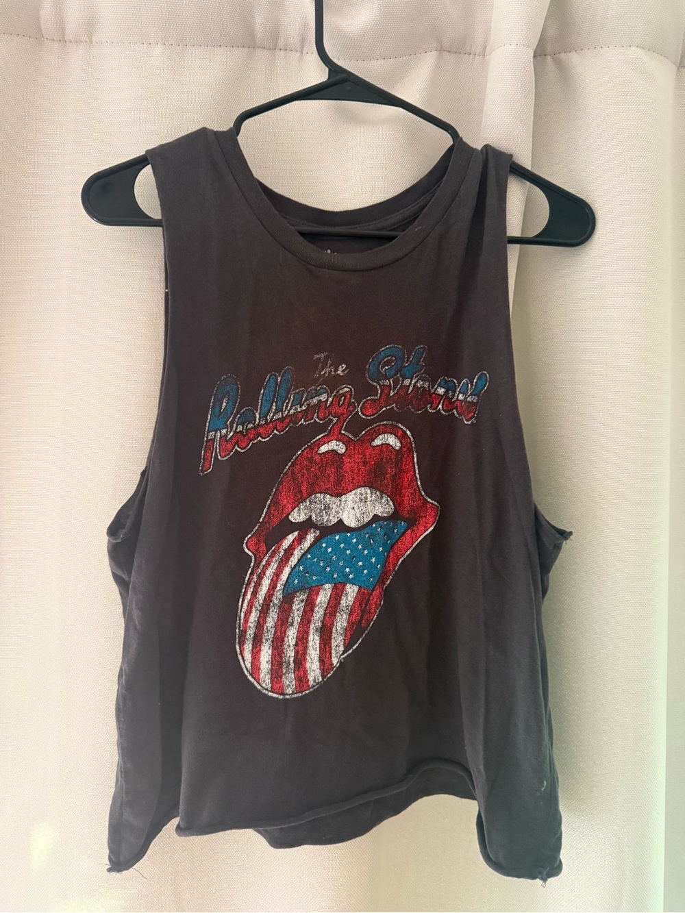 the Rolling Stones Black Tank Top with Red, White & Blue Tongue Graphic